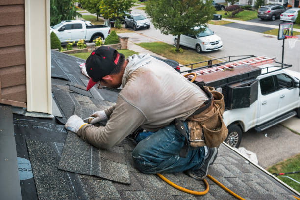 Professional Flat Roof Repair technician working in Clinton, MD